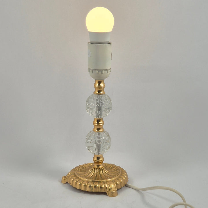 Elegant retro bordslampa med guldfot och glas