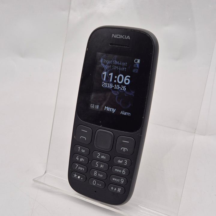 Klassisk Nokia knapptelefon kompakt och pålitlig