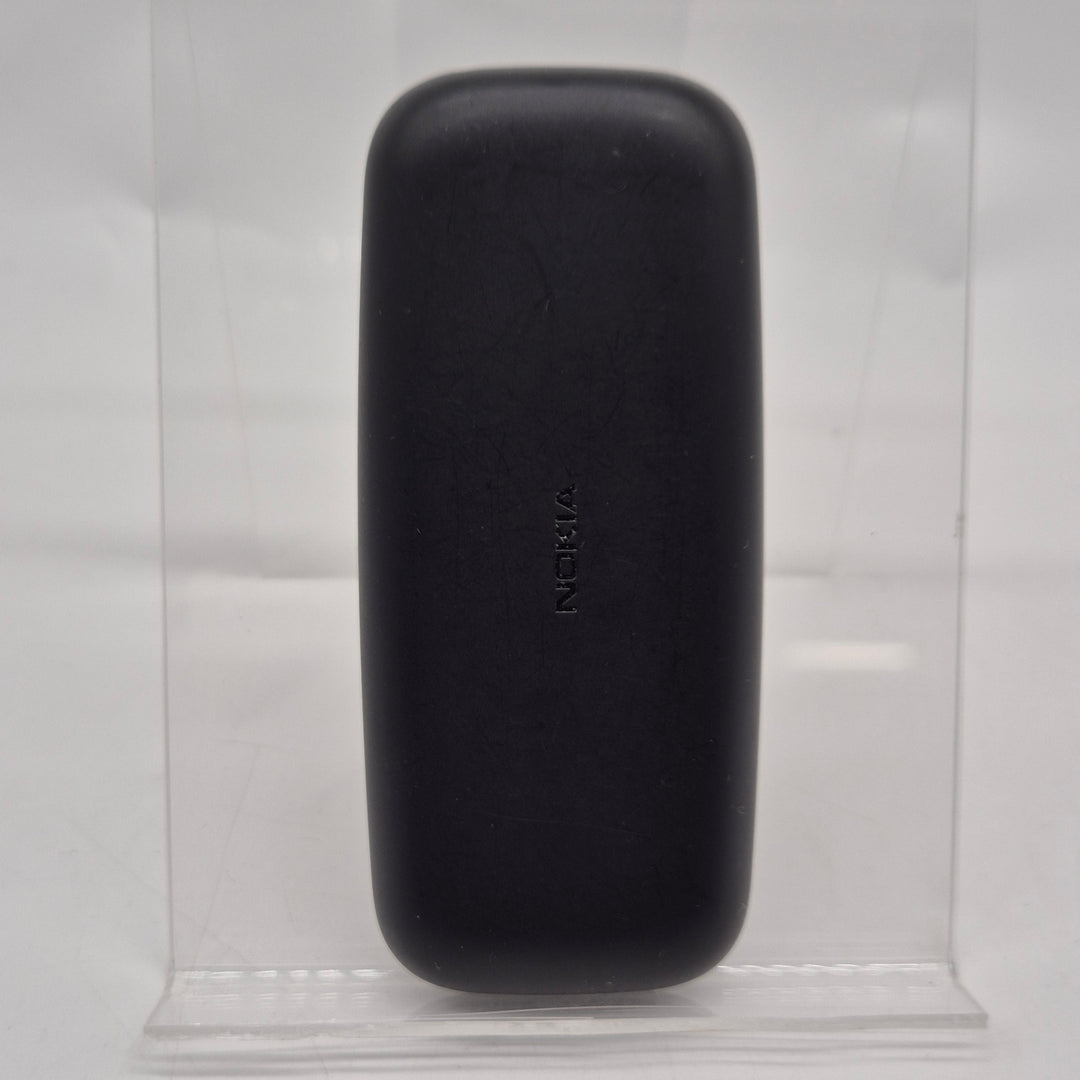 Klassisk Nokia knapptelefon kompakt och pålitlig