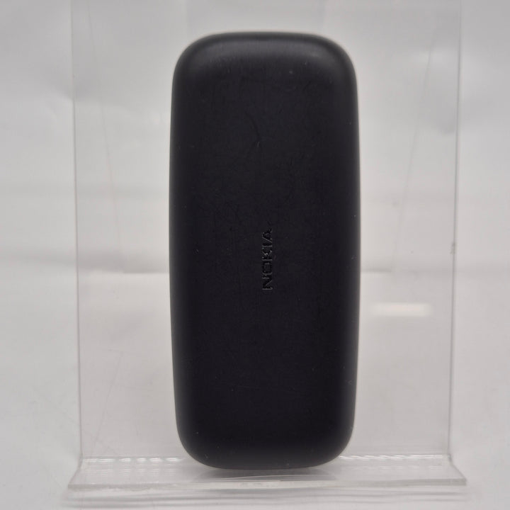 Klassisk Nokia knapptelefon kompakt och pålitlig