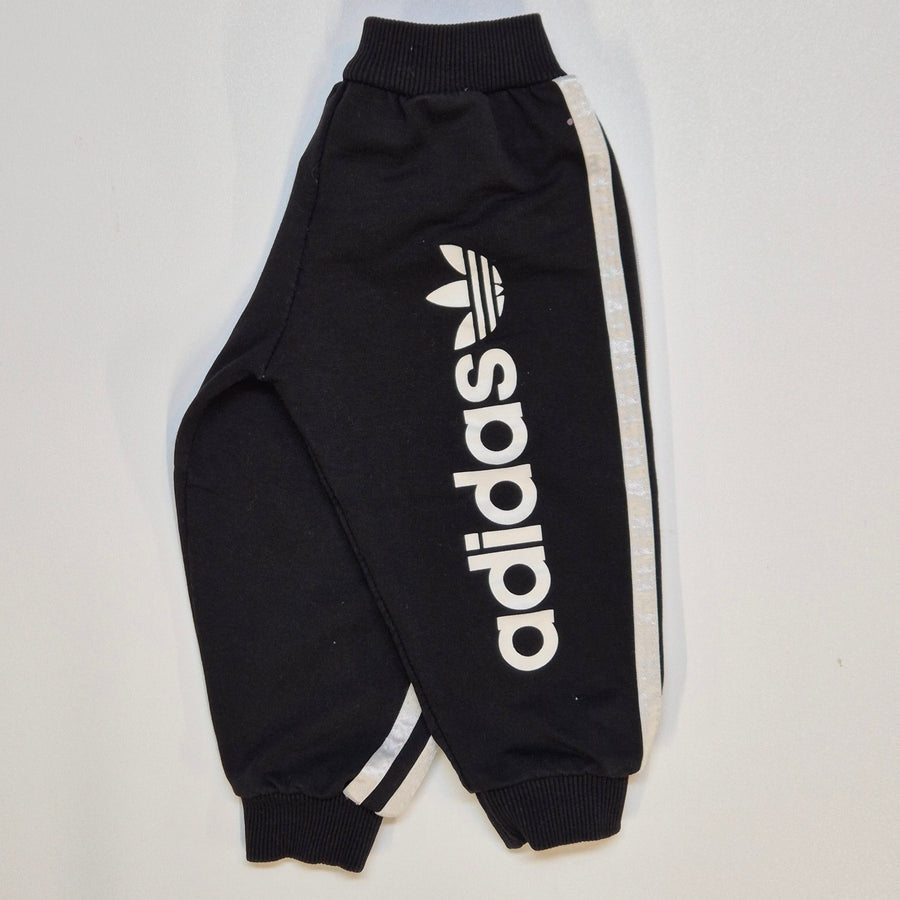 Svarta Adidas Joggingbyxor med Sidoränder - Homy Secondhand Online