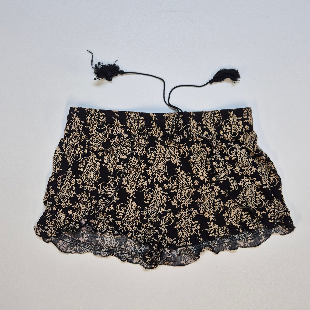 Svart spetskjol med guldtryck för damer - Homy Secondhand Online