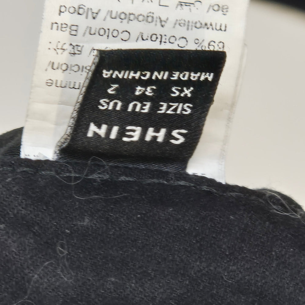 Svarta ribbade utsvängda byxor G.I.R.L - Homy Secondhand Online
