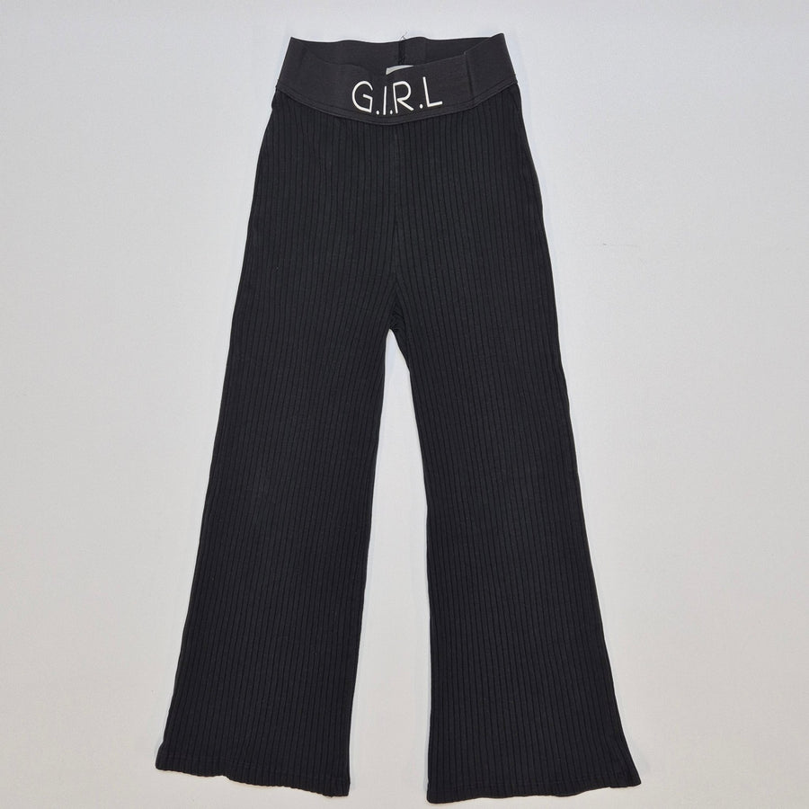 Svarta ribbade utsvängda byxor G.I.R.L - Homy Secondhand Online