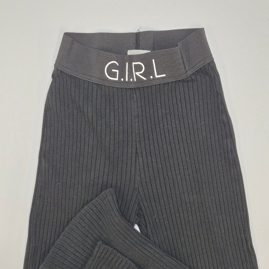 Svarta ribbade utsvängda byxor G.I.R.L - Homy Secondhand Online