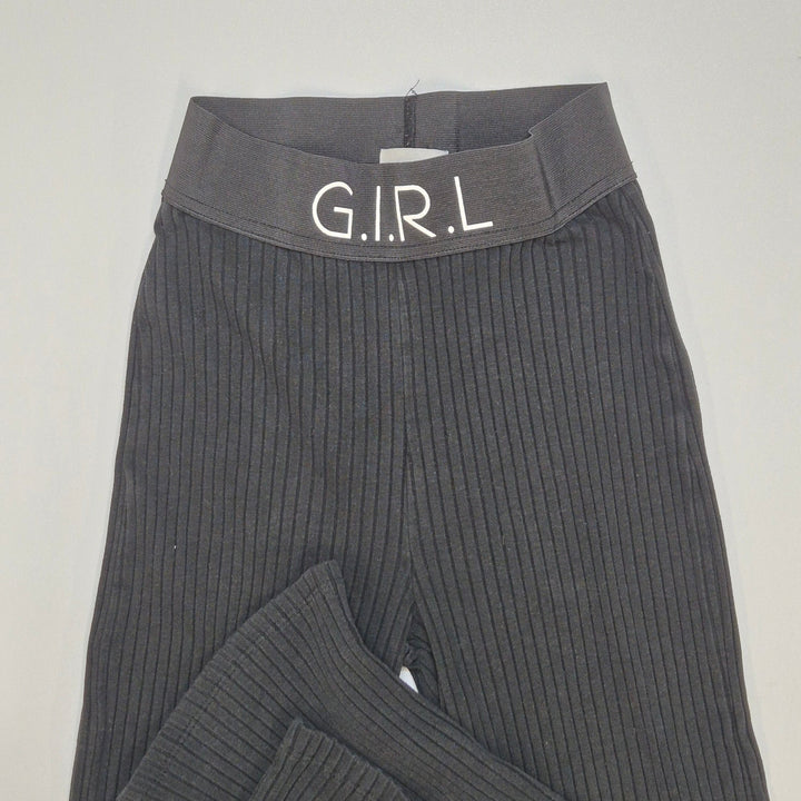 Svarta ribbade utsvängda byxor G.I.R.L - Homy Secondhand Online