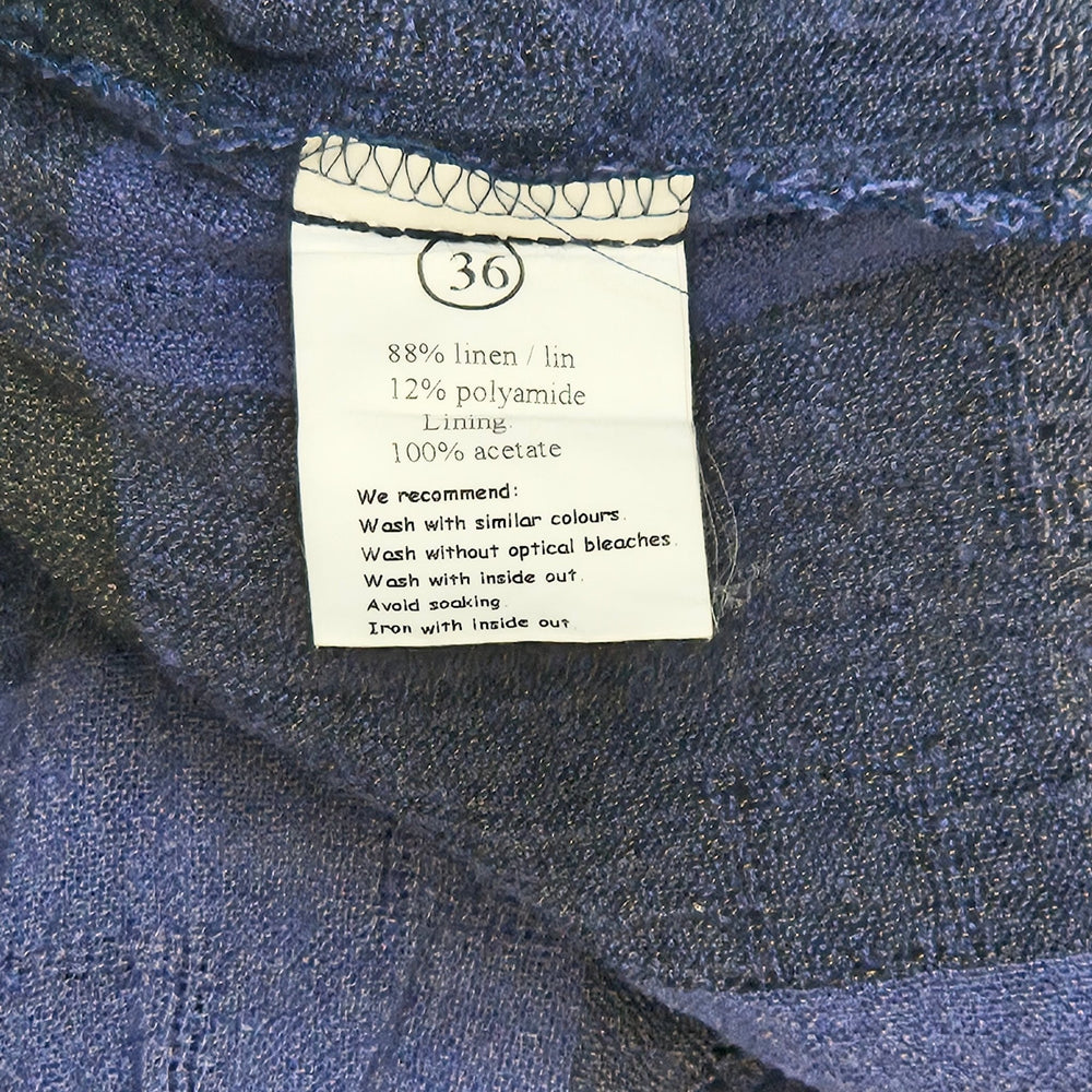Charmig blå rutig sommarklänning i linne - Homy Secondhand Online