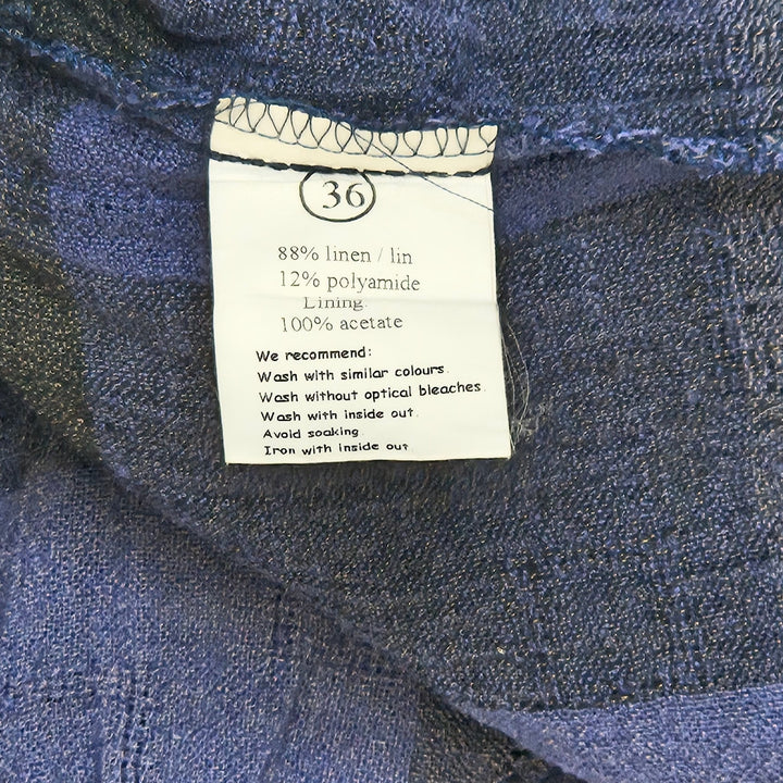 Charmig blå rutig sommarklänning i linne - Homy Secondhand Online