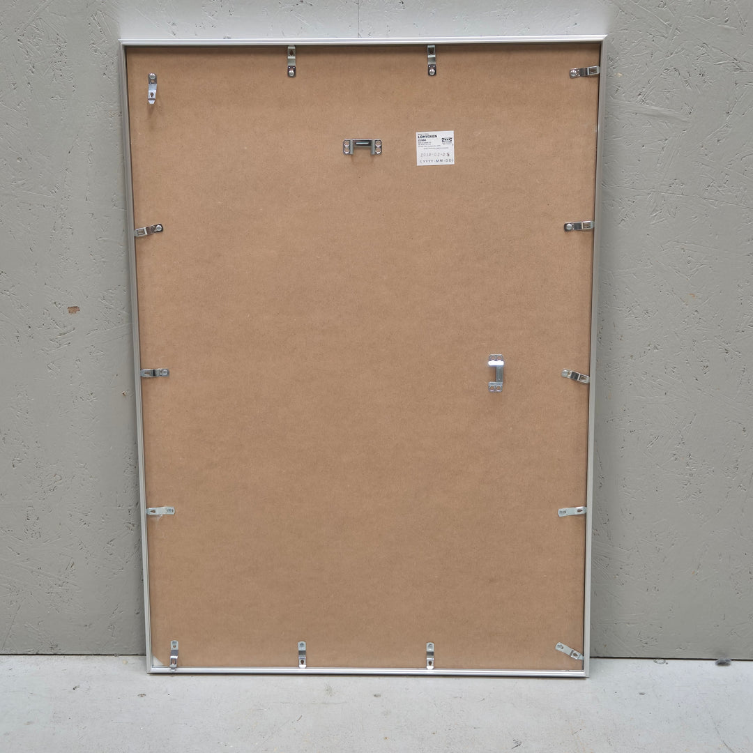 Inramat Blomtryck i Vit Ram