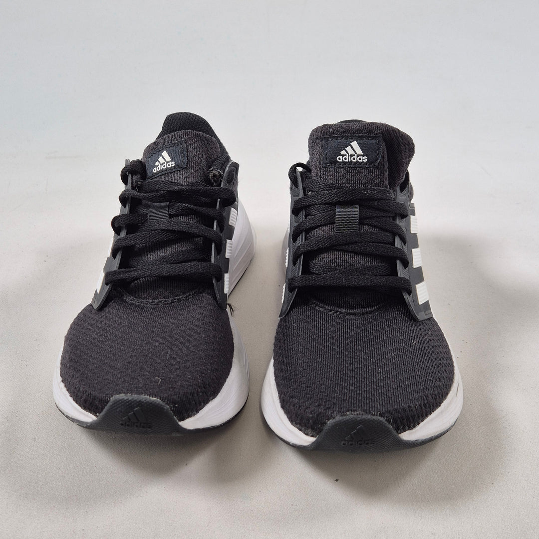 Adidas löparskor svart vita detaljer begagnad
