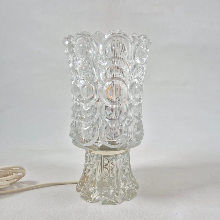 Retroinspirerad bordslampa i glas med mönster