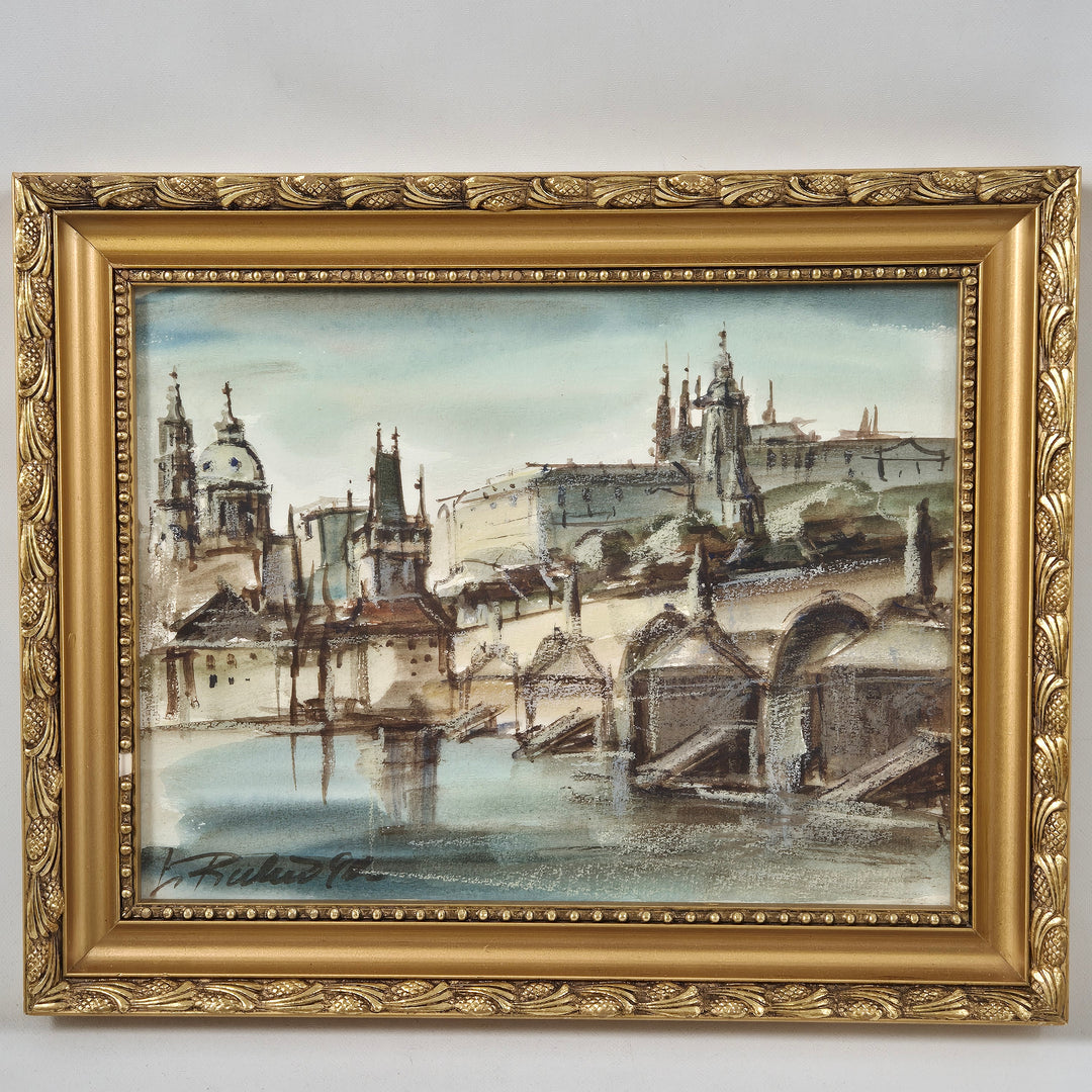 Inramad tavla av Prag i gyllene ram