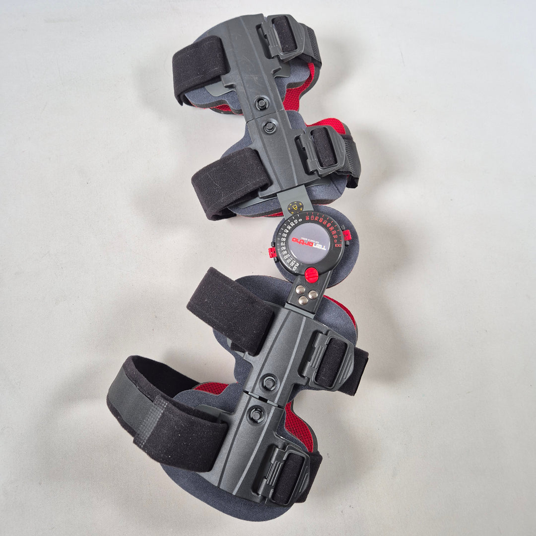 Justerbar Tenortho knäortos för återhämtning