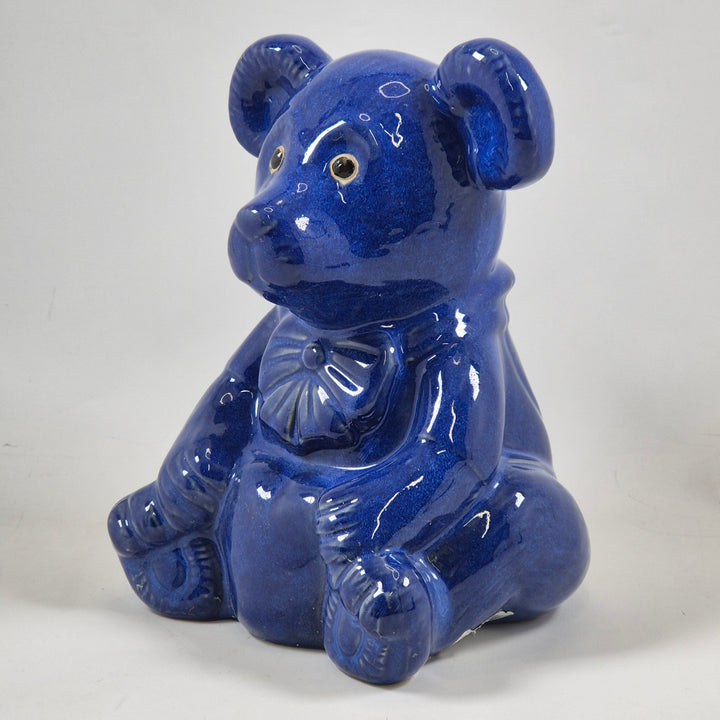 Charmig retroskinspirerad keramikbjörn i djupblått