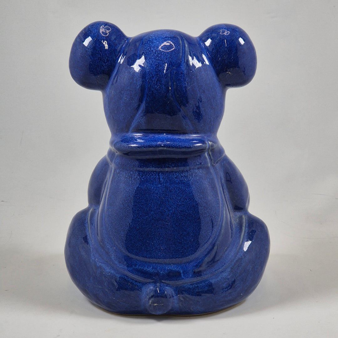 Charmig retroskinspirerad keramikbjörn i djupblått