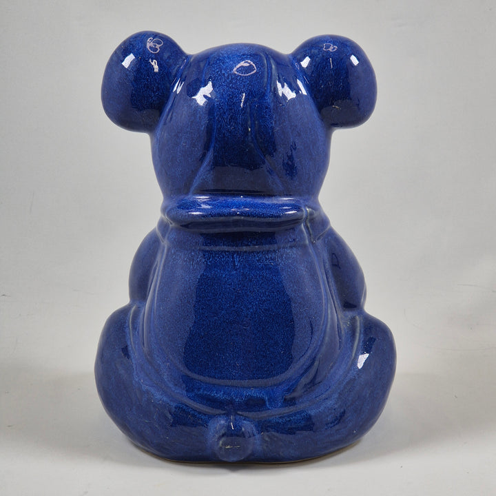 Charmig retroskinspirerad keramikbjörn i djupblått