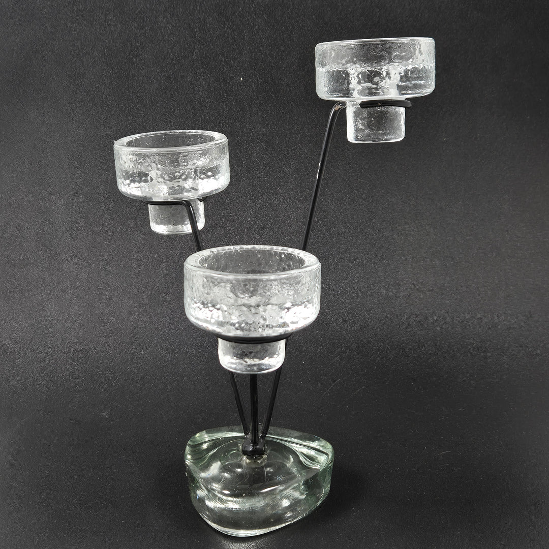 Elegant unikt ljusstakeset av glas och metall