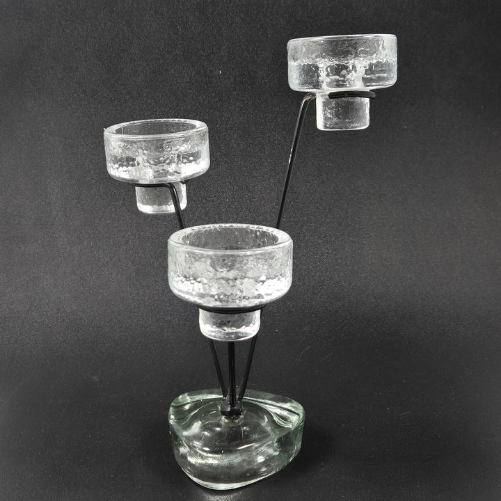 Elegant unikt ljusstakeset av glas och metall