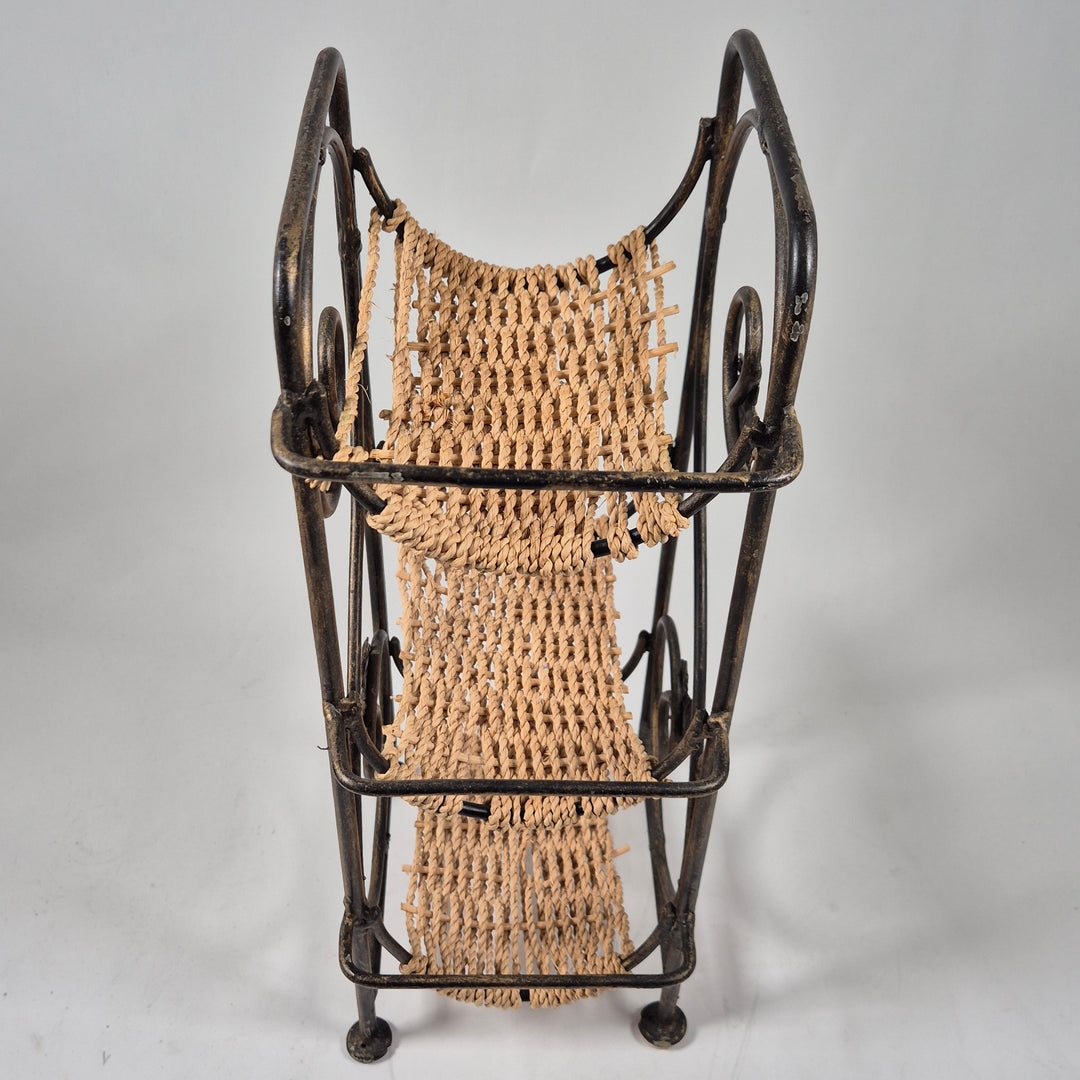 Retro blomsterhylla i metall och rep