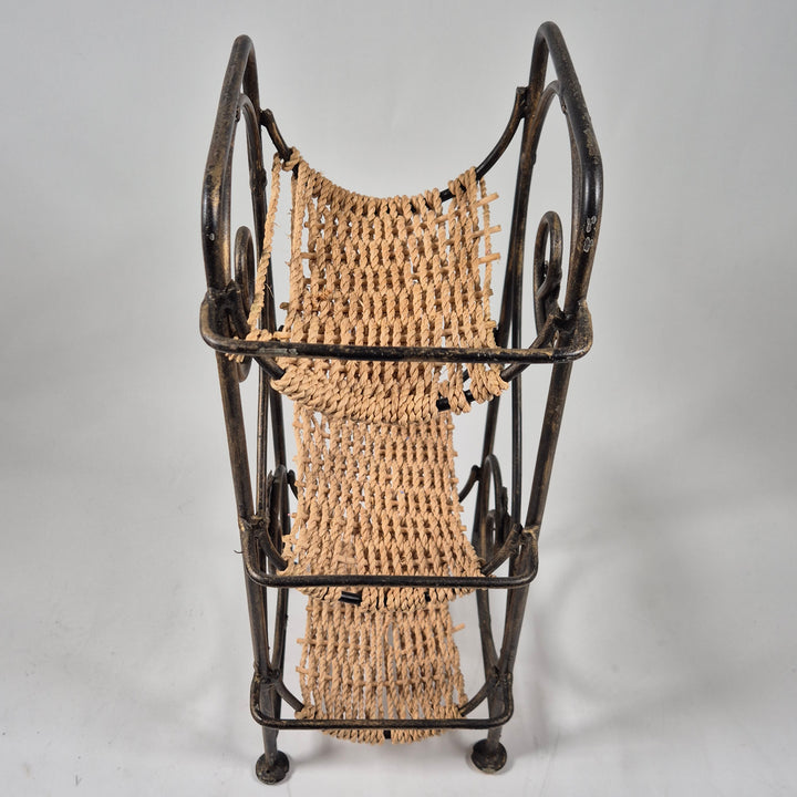 Retro blomsterhylla i metall och rep