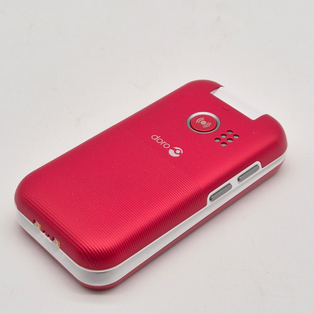 Röd Doro knapptelefon med trygghetsknapp