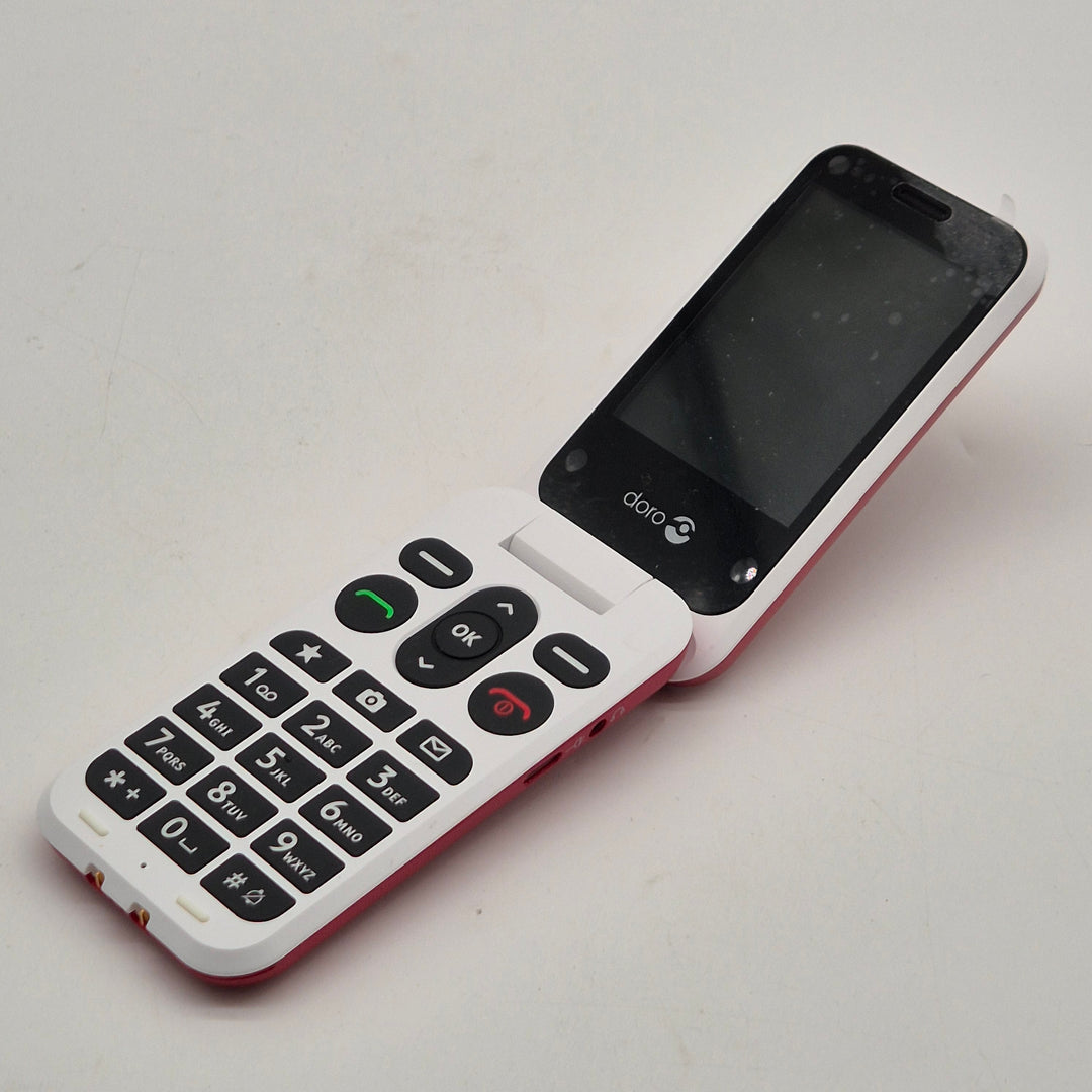 Röd Doro knapptelefon med trygghetsknapp