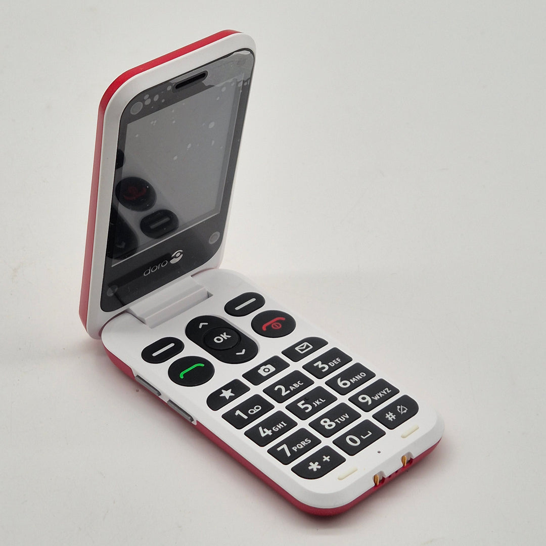 Röd Doro knapptelefon med trygghetsknapp