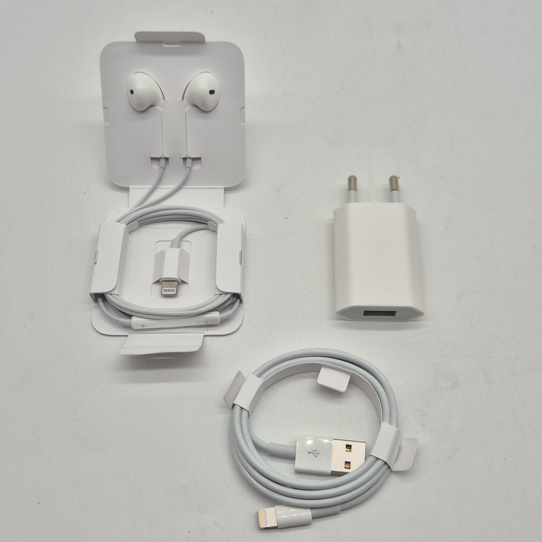 Vitt iPhone laddar och hörlursset begagnat