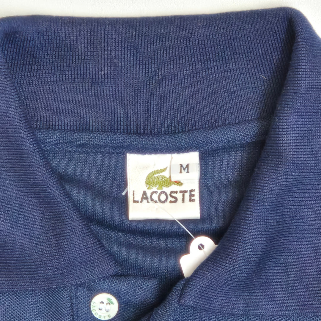 Klassisk mörkblå Lacoste pikétröja M