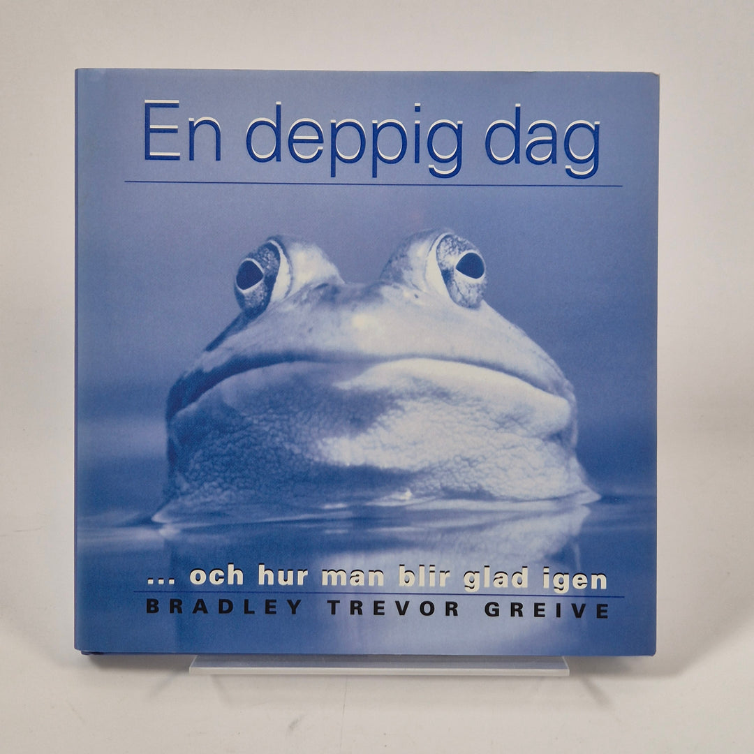 En deppig dag bok grodmotiv blå