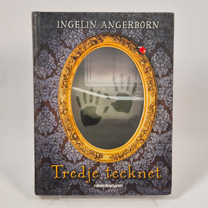 Tredje tecknet inbunden barnbok spänning