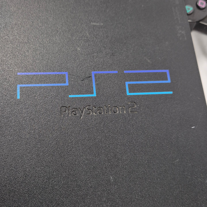 Retro Sony PlayStation 2 fat med två handkontroller