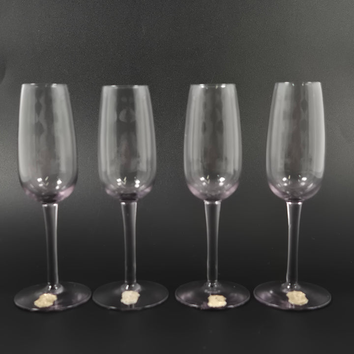 Eleganta lila champagneglas i set om fyra