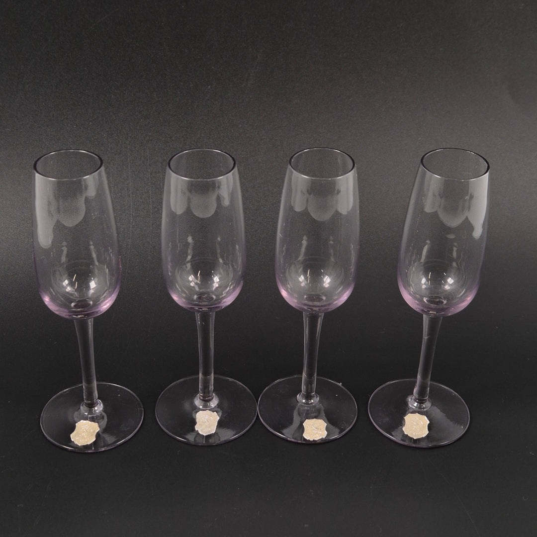 Eleganta lila champagneglas i set om fyra