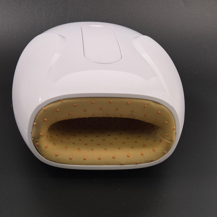 Vit modern handmassager med automatisk avstängning