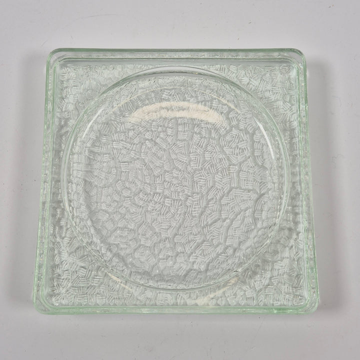Elegant kvadratisk glasskål med strukturerad yta
