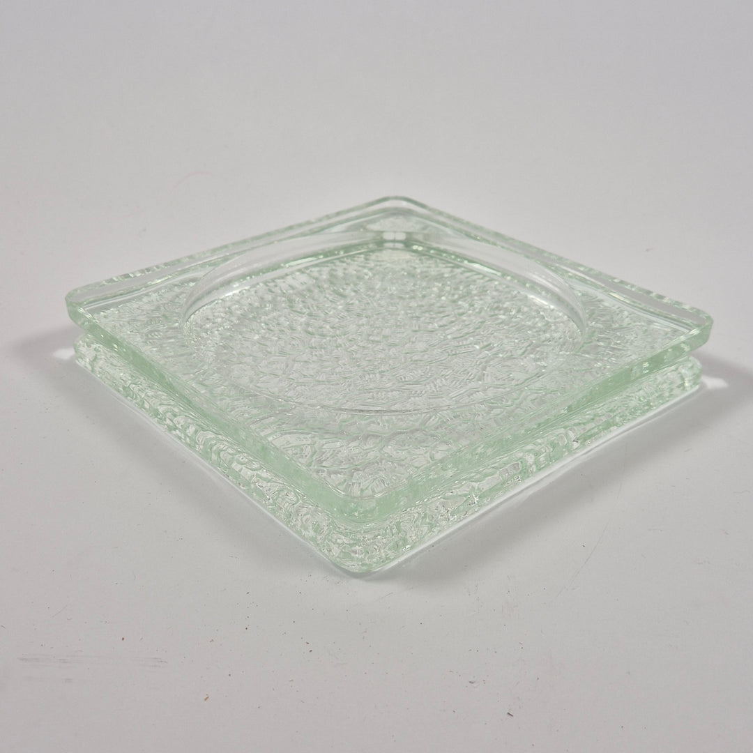 Elegant kvadratisk glasskål med strukturerad yta