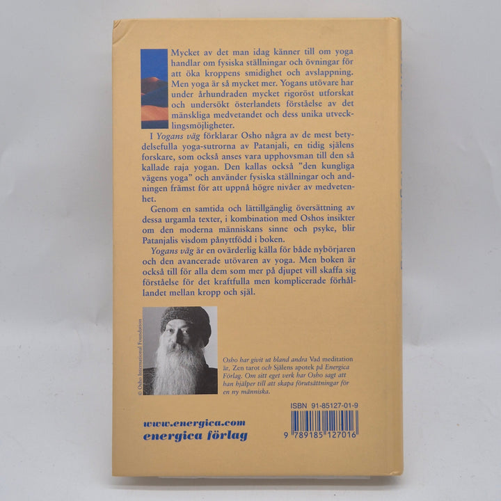 Yogans väg Osho inbunden bok gulblå