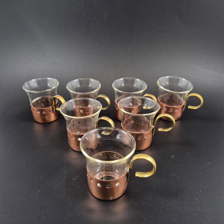 Retro espressokoppar i glas med kopparhölje