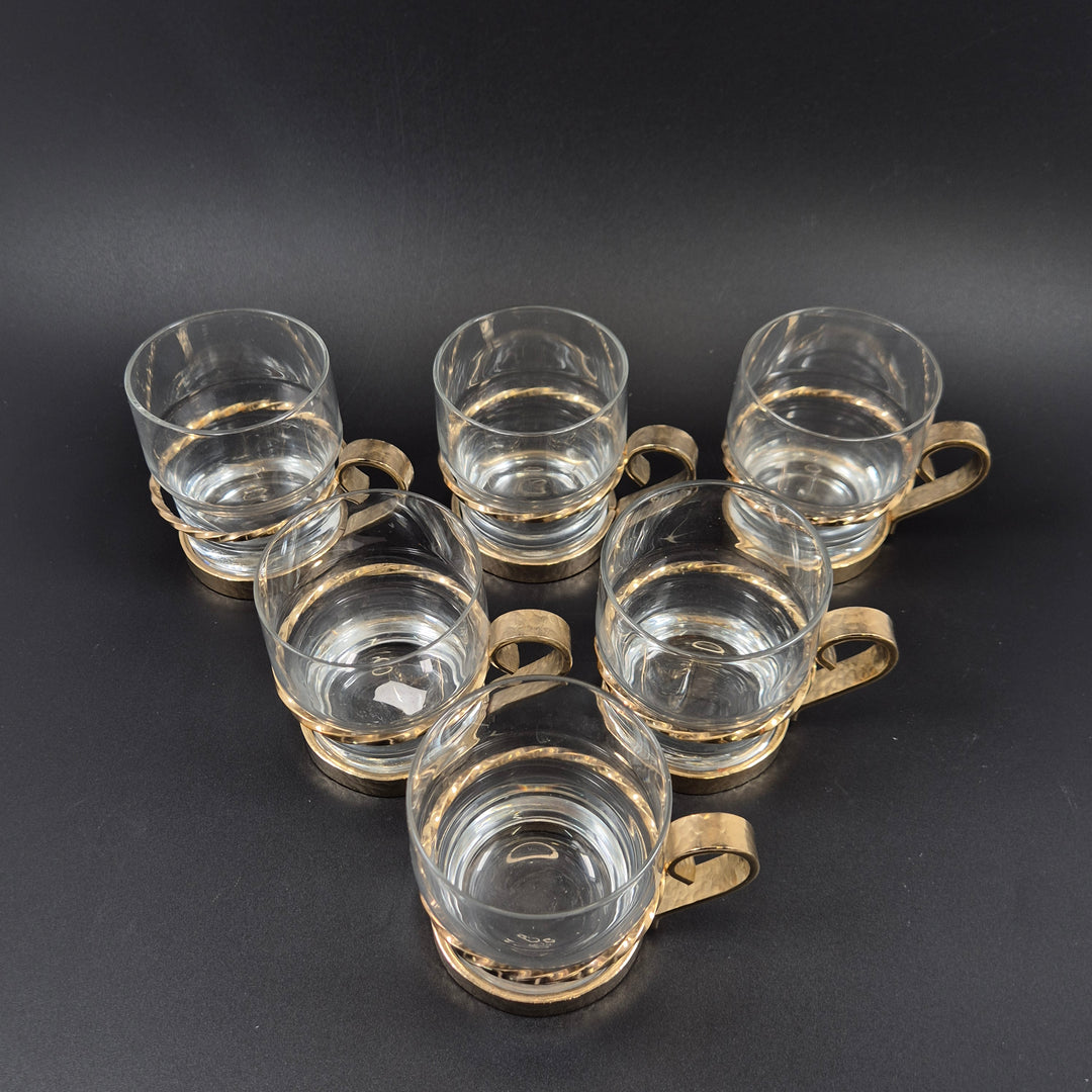 Retro kaffeglas med guldfärgade metallhållare