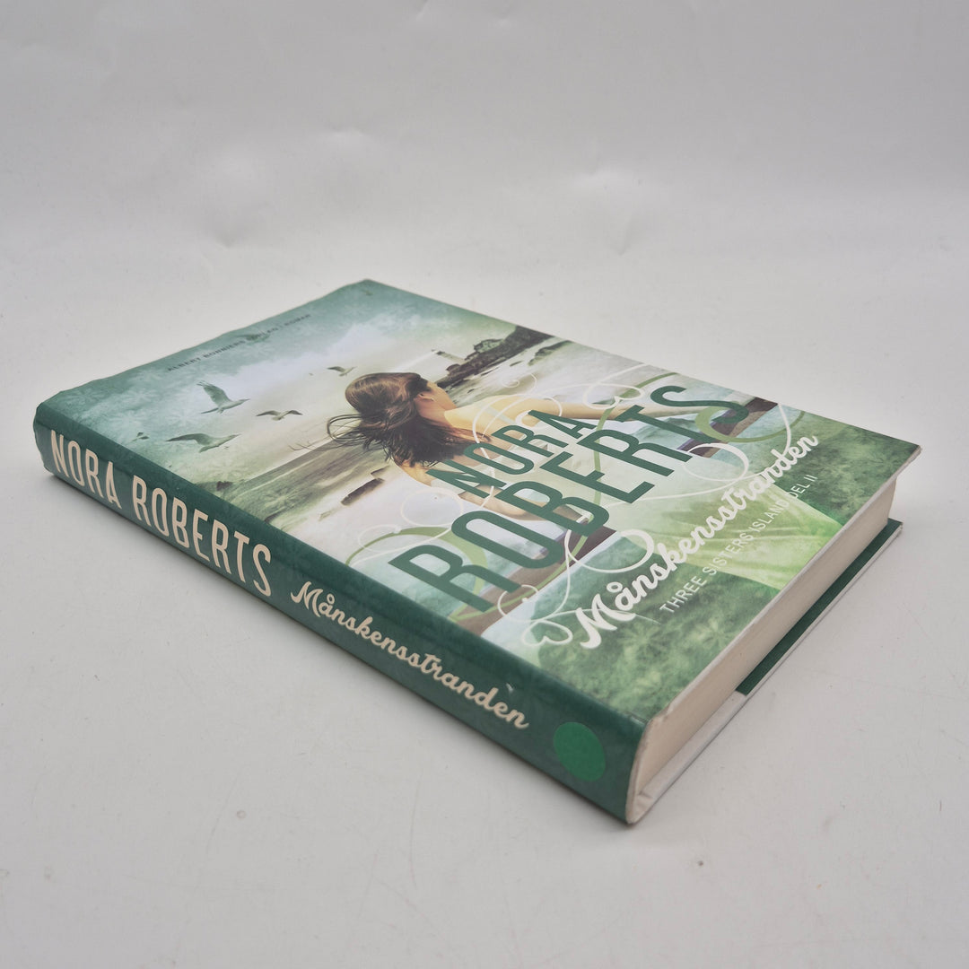 Månskensstranden bok inbunden Nora Roberts begagnad