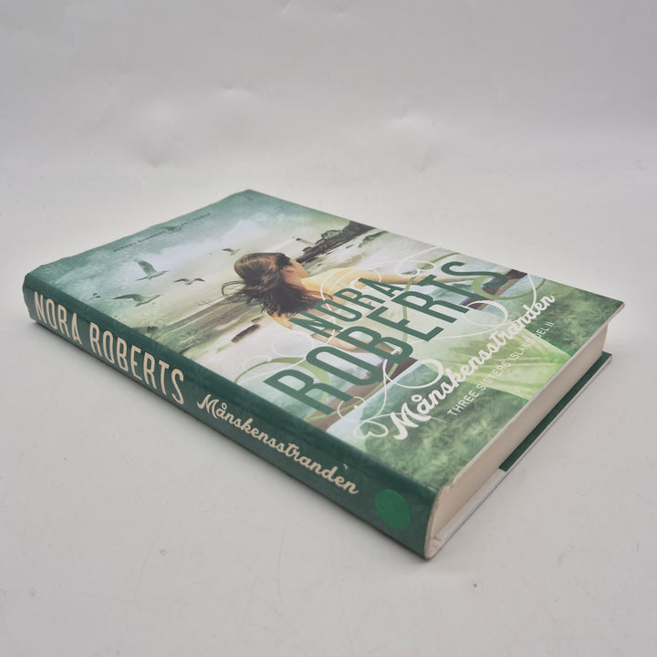 Månskensstranden bok inbunden Nora Roberts begagnad
