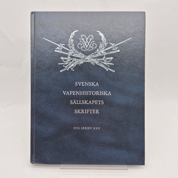 Inbunden blå fackbok vapenhistoria elegant retro