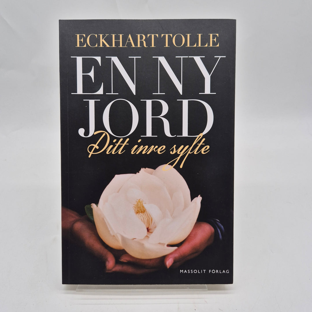 En ny jord Eckhart Tolle pocketbok begagnad