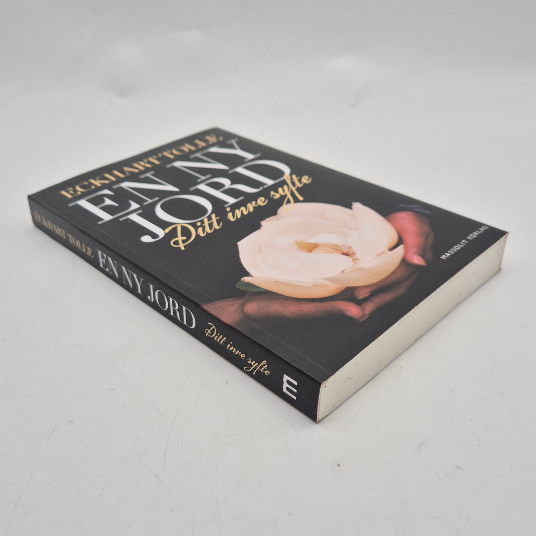 En ny jord Eckhart Tolle pocketbok begagnad