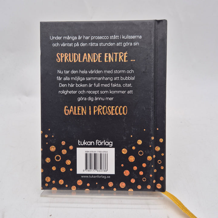 Prosecco presentbok glittrigt svart guld Tukan
