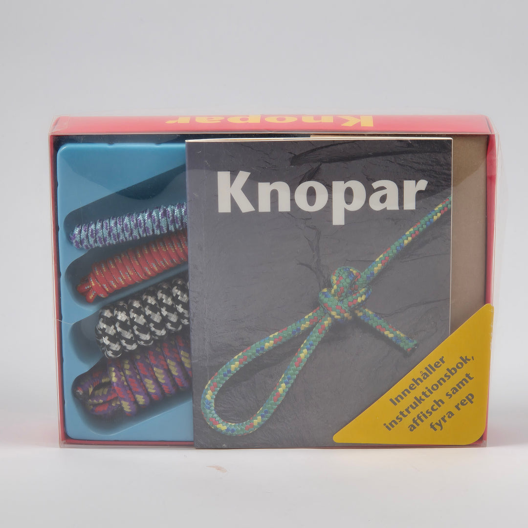 Knopset med bok affisch och färgglada rep