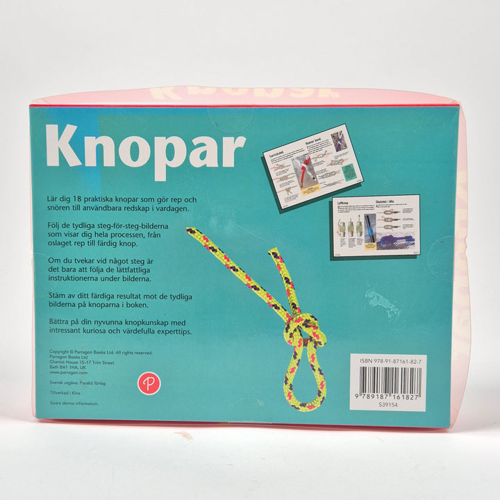 Knopset med bok affisch och färgglada rep