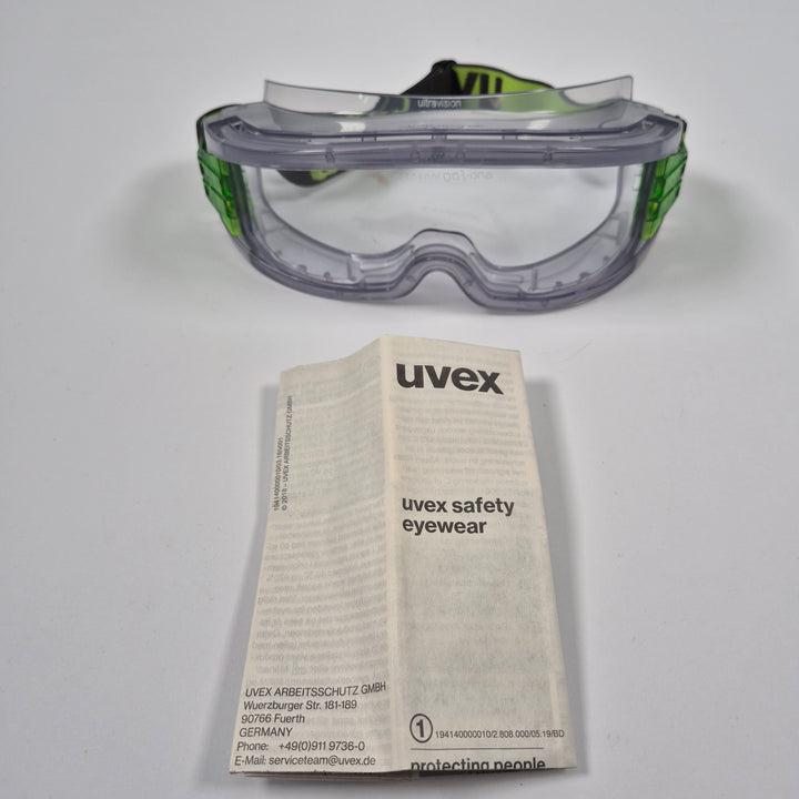 Uvex skyddsglasögon klar lins neongrönt band