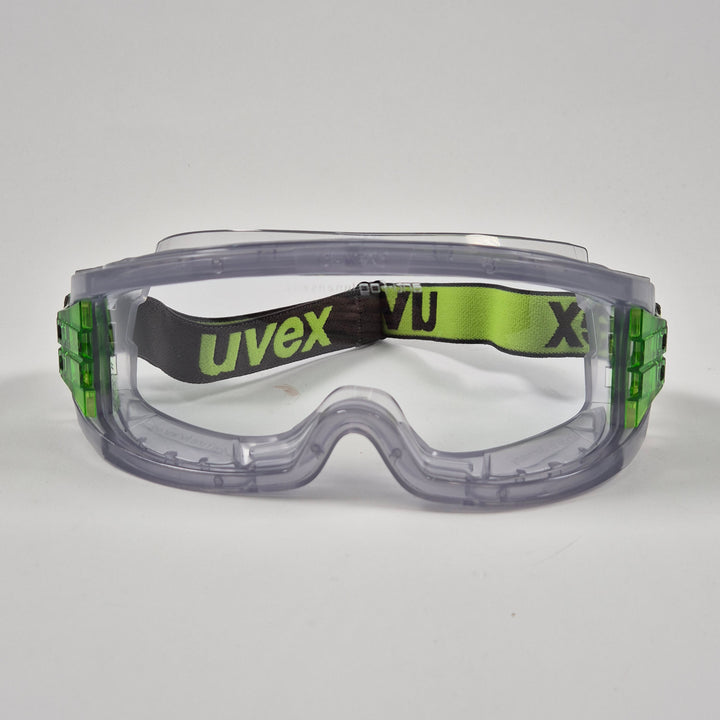 Uvex skyddsglasögon klar lins neongrönt band